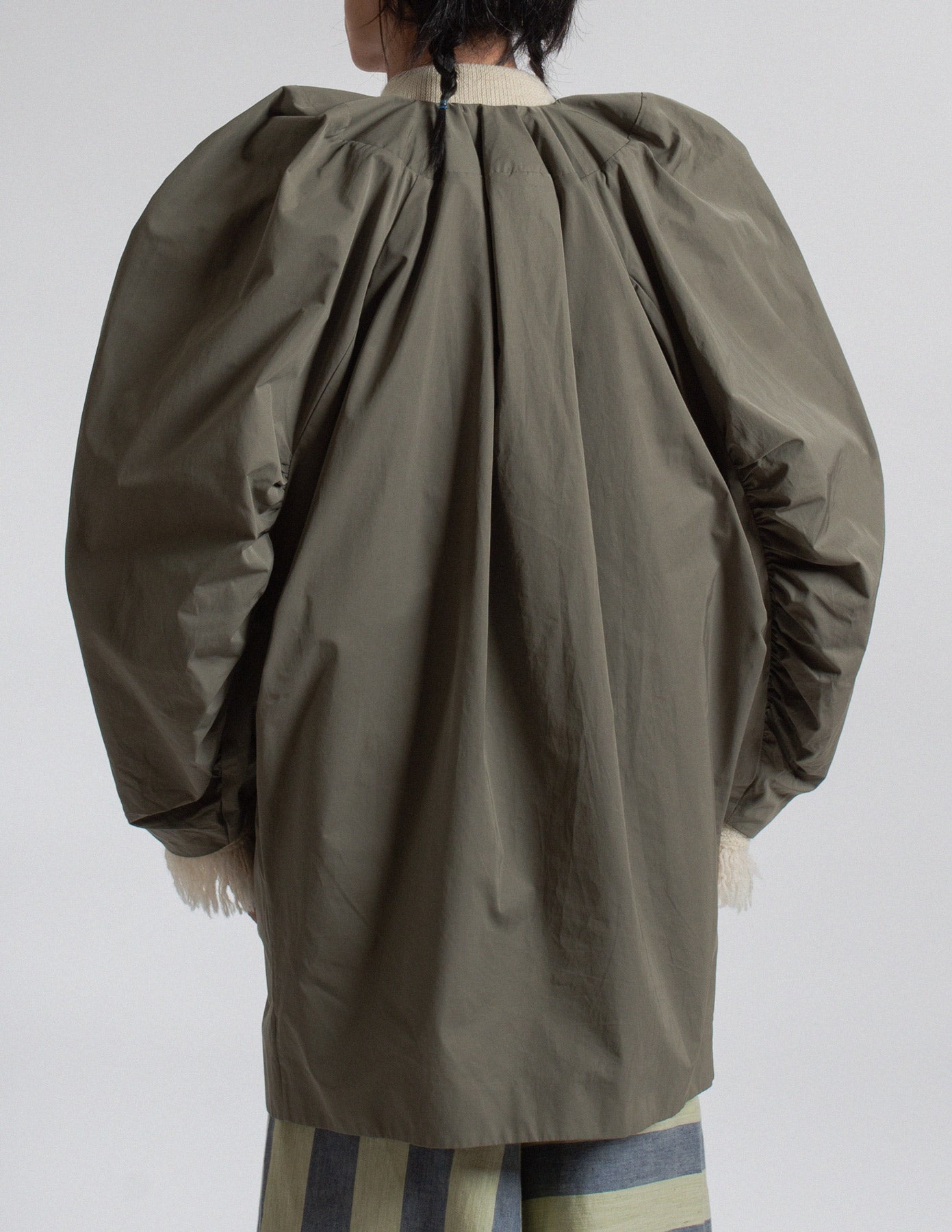 Dries Van Noten olive-toned sculptural cocoon jacket back detail