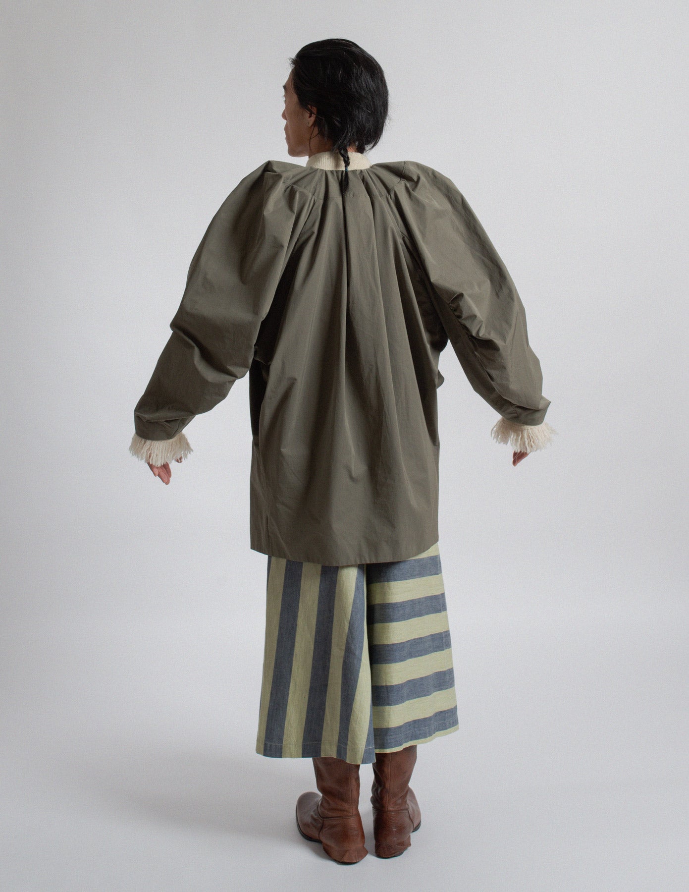 Dries Van Noten olive-toned sculptural cocoon jacket back view