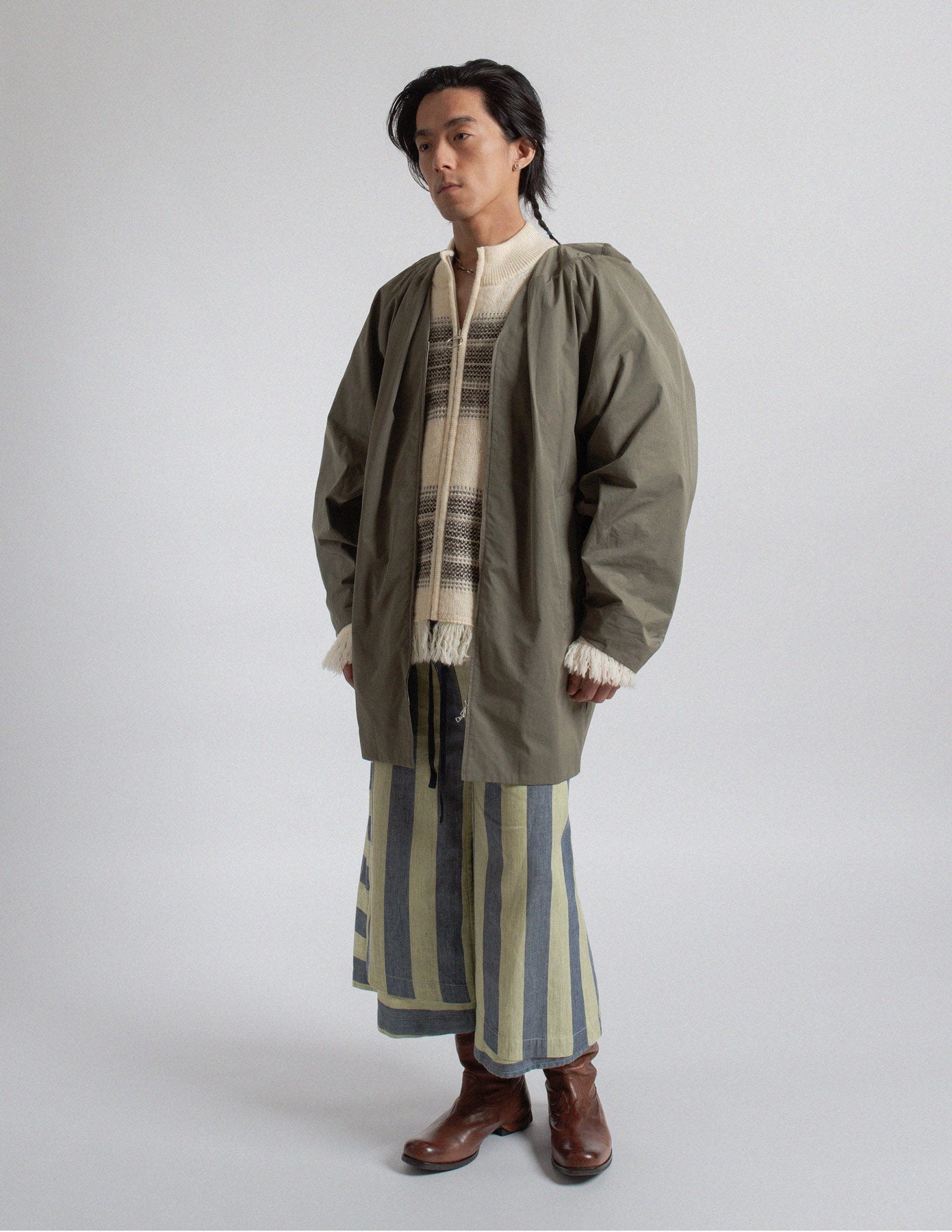 Dries Van Noten olive-toned sculptural cocoon jacket side view