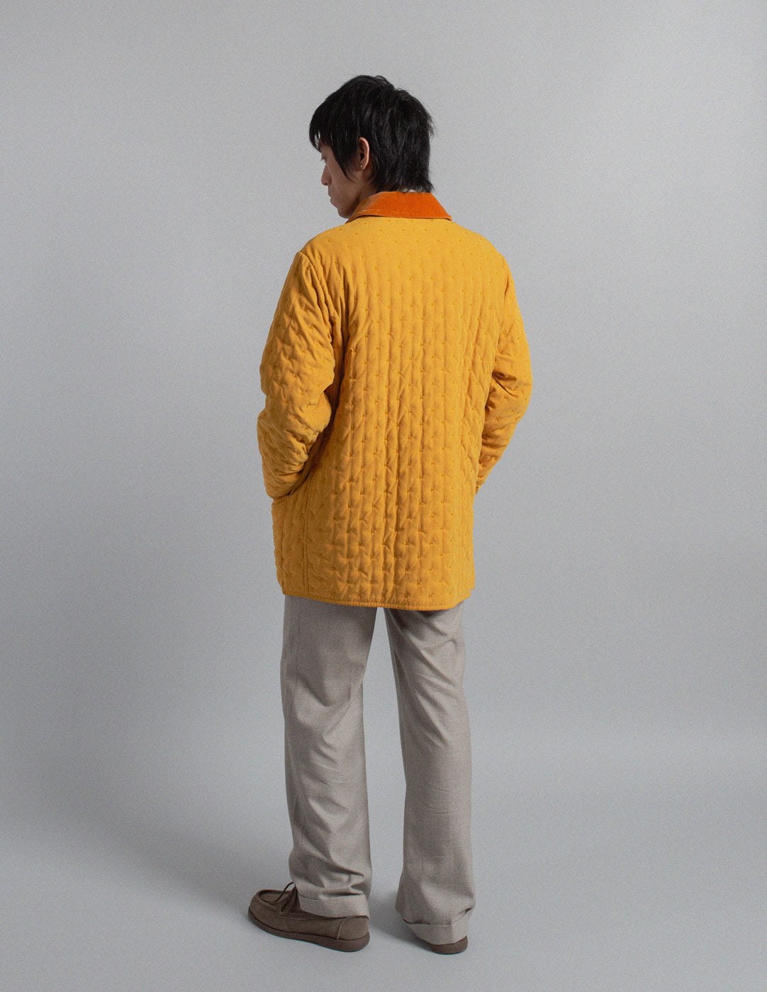 Hermès vintage marigold quilted coat with contrasting velvet collar back view