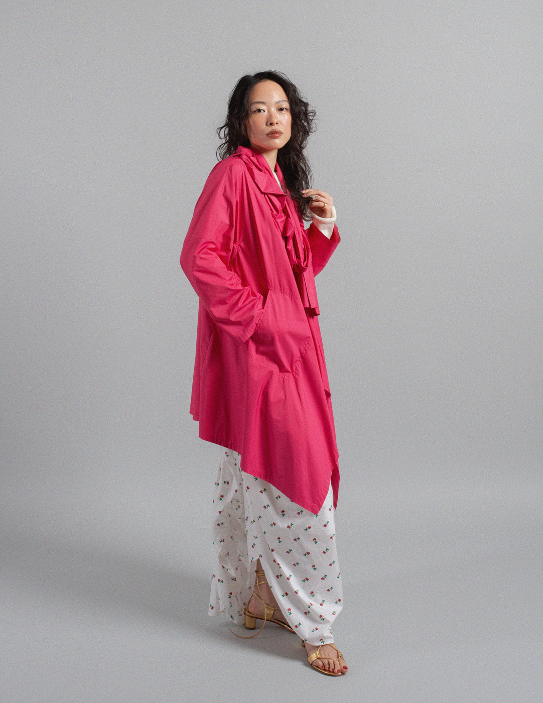 Issey Miyake fuchsia ruffle spring coat side view