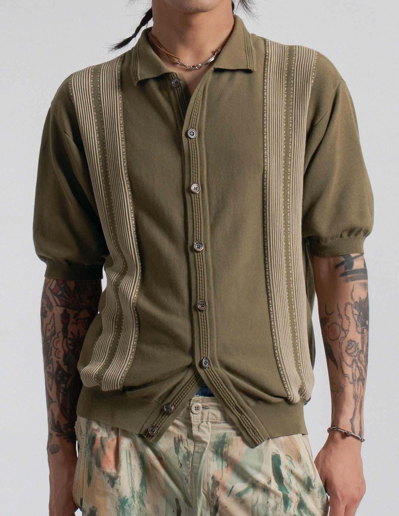 Kapital olive-toned jacquard stripe knit polo front detail