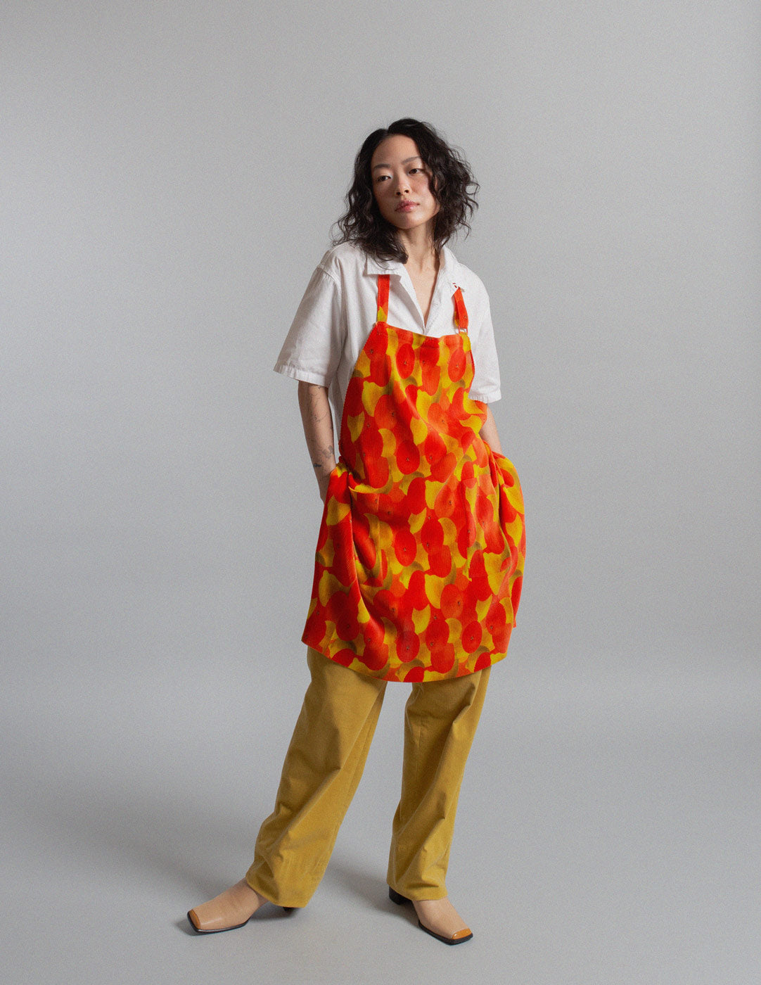 Pleats Please vintage orange lemon print pleated apron dress