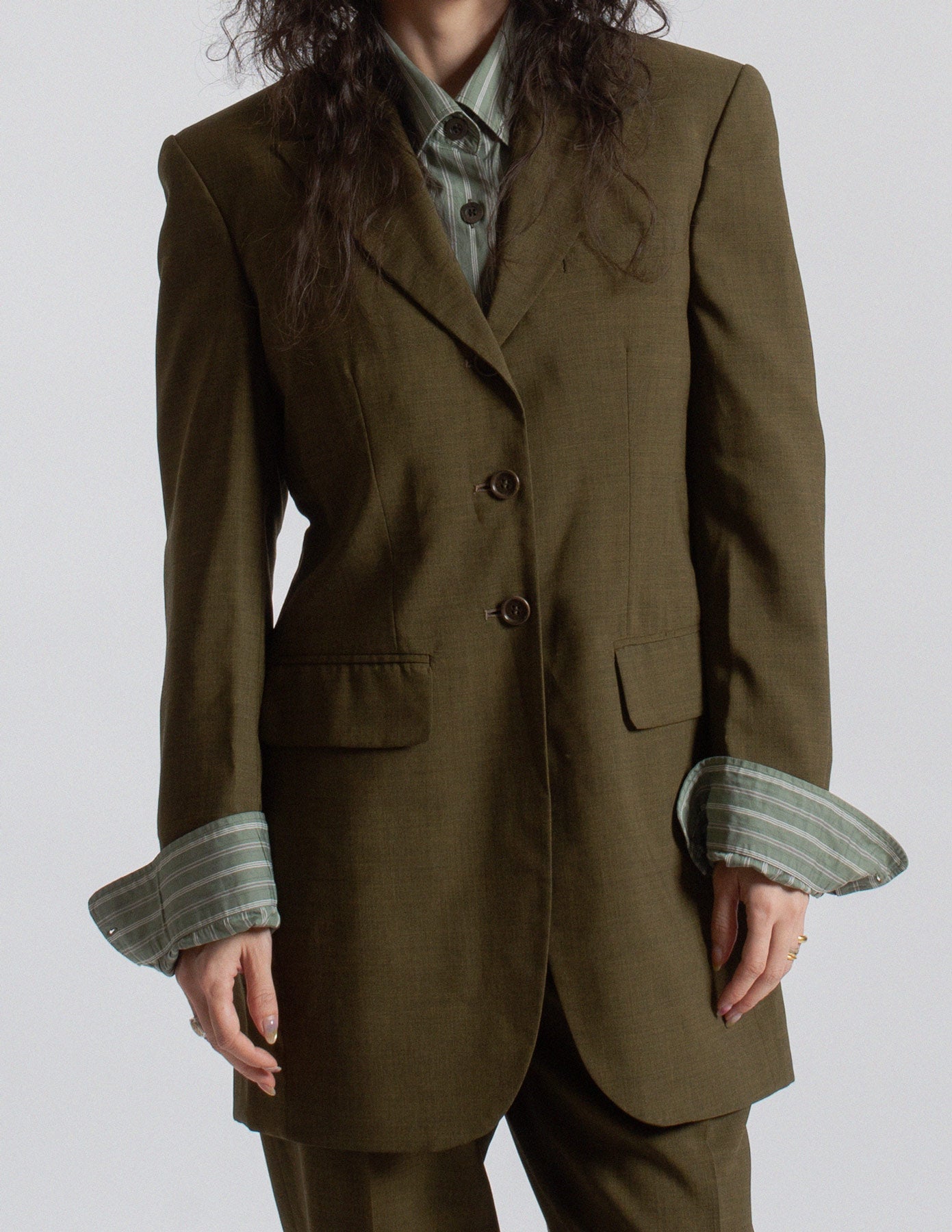 Romeo Gigli vintage olive green wool tailored suit front detail