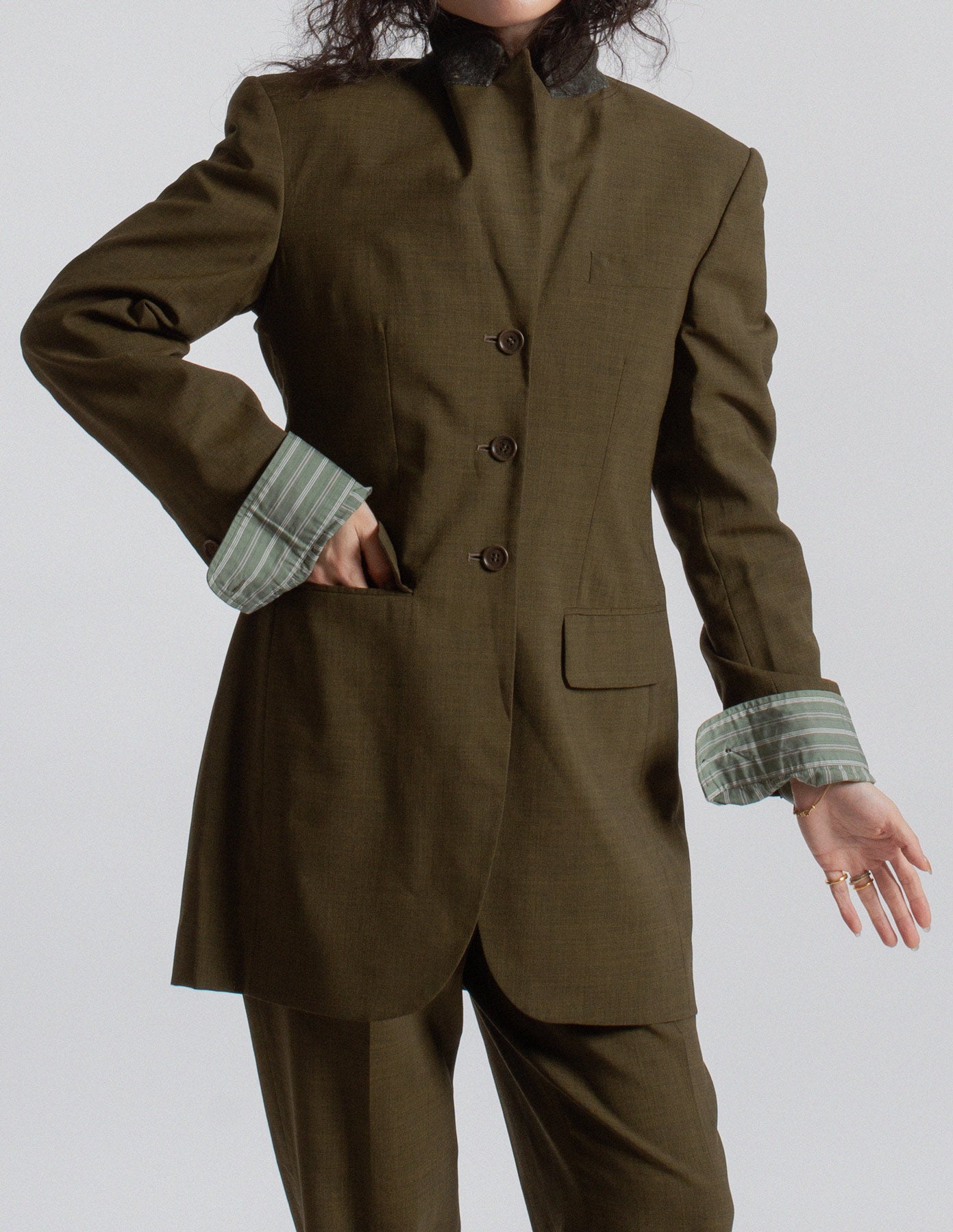 Romeo Gigli vintage olive green wool tailored suit detail