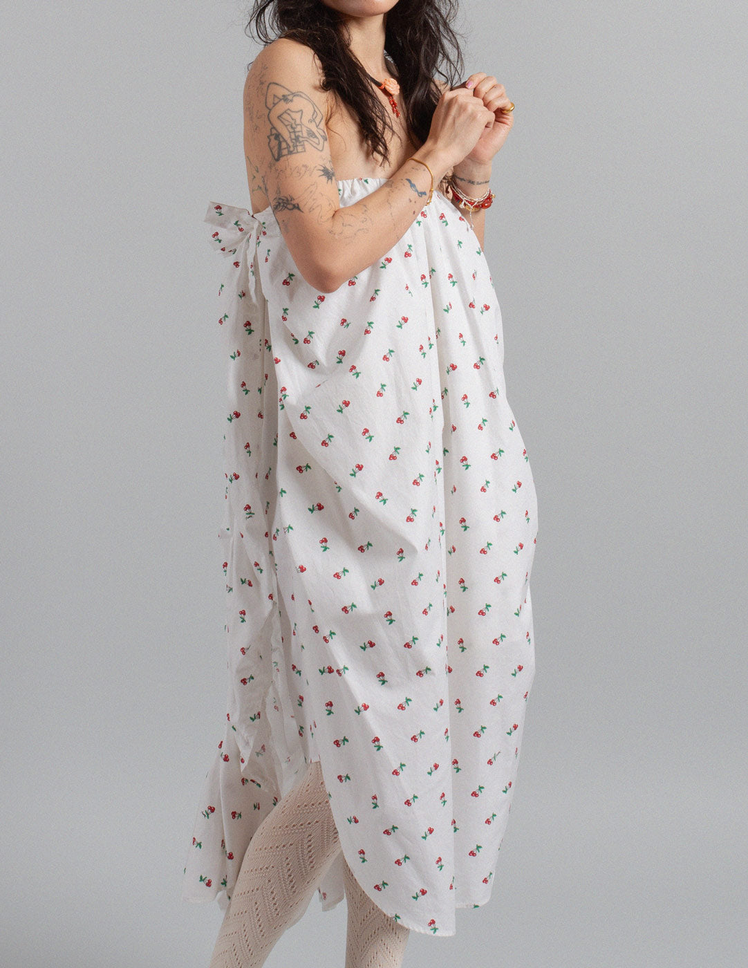 Yves Saint Laurent cherry print ruffled cotton dress side detail