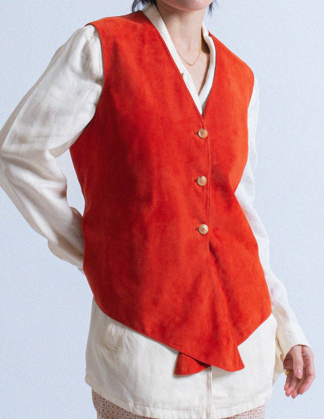 Hermès vintage orange goat suede and lambskin vest front detail